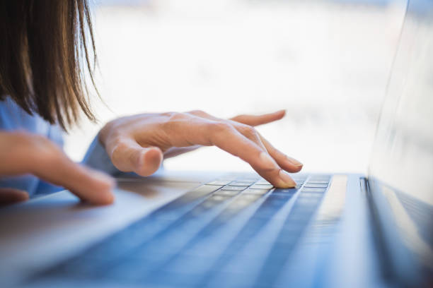 Typing on a Laptop in the Morning