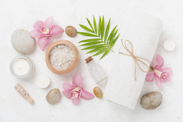 istock Composition with orchids, spa products on concrete background, top view 2159935664