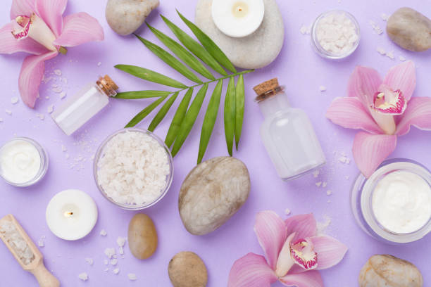 istock Composition with orchids, spa products on color background, top view 2159935676