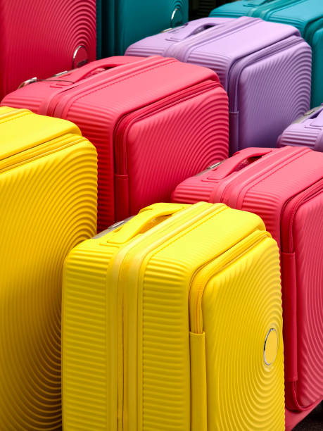 istock A vibrant assortment of suitcases is carefully arranged in a pile 2159936310