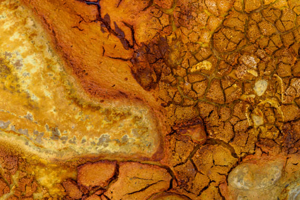 istock Sunlit Cracked Clay Soil in Rio Tinto 2159936423