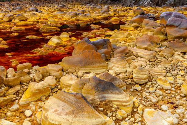 istock Orange Mineral Formations and Puddles at Rio Tinto 2159936558