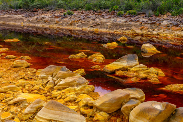 istock Orange Mineral Formations and Puddles at Rio Tinto 2159936563
