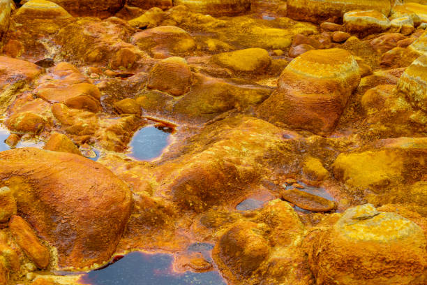 istock Orange Mineral Formations and Puddles at Rio Tinto 2159936576