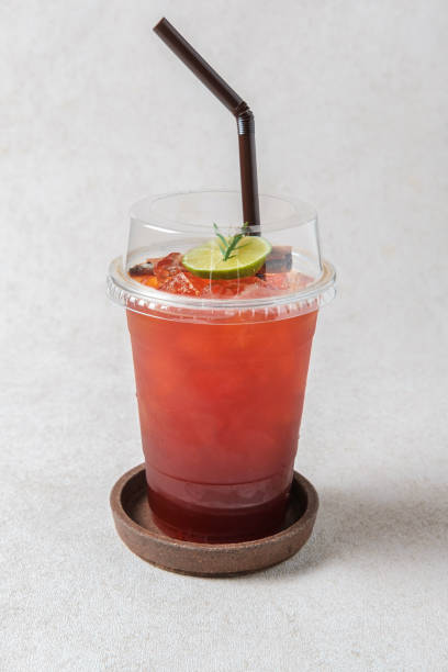 istock Thai Iced Lime Tea in a plastic glass 2159940052