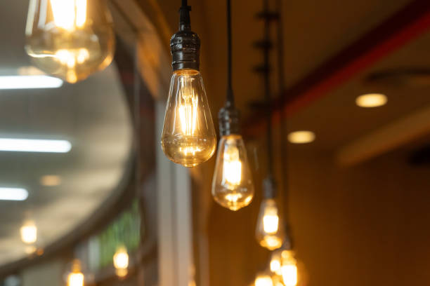 istock A series of light bulbs hanging from the ceiling 2159941177