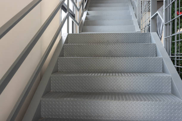 istock A staircase with a metal railing and a shiny, metallic surface 2159941193