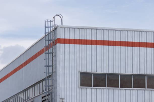 istock A large building with a red stripe on the side 2159941346