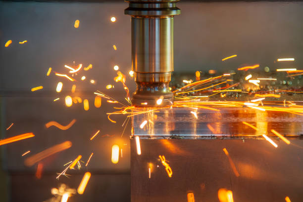 istock The burning chip from wear cutting tools on CNC milling machine. 2159943318