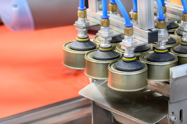 istock The high technology material handling process in canned food production by robotic system. 2159943352