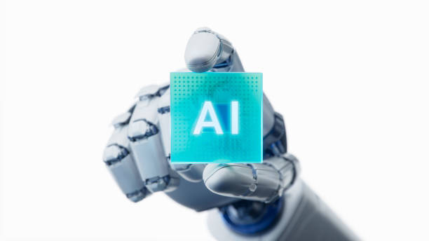 istock White Hand of Humanoid Robot is Holding at its Fingertips Innovative and Advanced AI Accelerated Chip. Humanoid Robot Hand with Glowing Futuristic Processor. Cooperation with Artificial Intelligence 2159943674