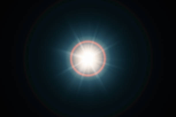 Lens flare on black background. Overlay design element