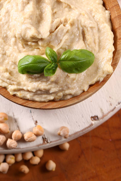 istock traditional chickpea hummus with olive oil 2159947145