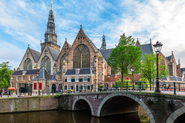 Oude Kerk, old church, in Amsterdam, Dutch Oude Kerk, old church, is the oldest building of Amsterdam in Dutch oudezijds voorburgwal stock pictures, royalty-free photos & images