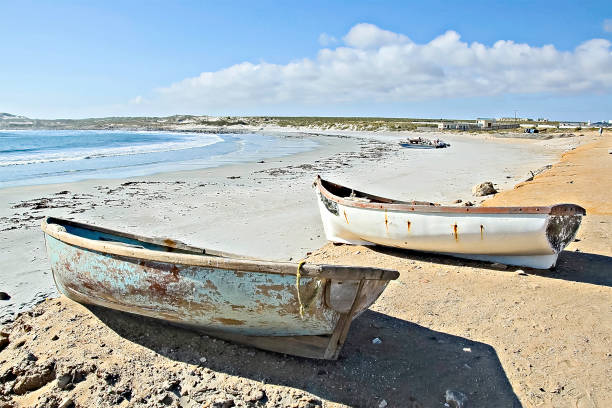 istock Two dinghies on the beach at Hondklipbaai 2159947429