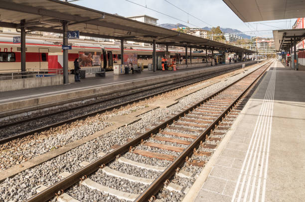 Lugano, Ticino, Switzerland - February 19, 2020: Passengers waiting for the train at the Lugano railway station.