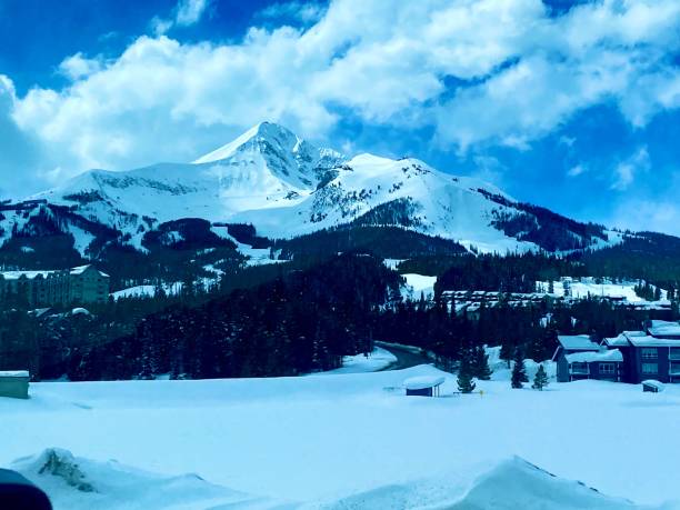 istock Snow Covered Mountain against Blue Skies 2159951061