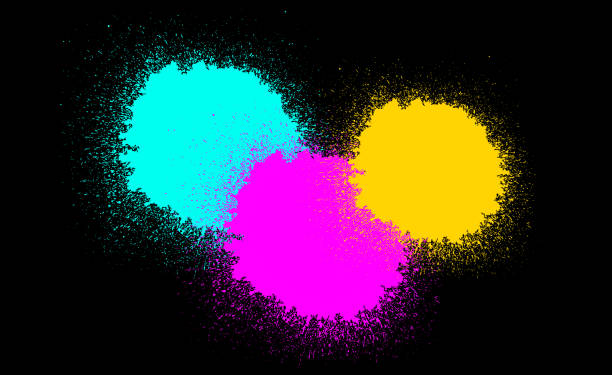istock Colorful cyan, magenta, and yellow ink splatters are creating an abstract design 2159951270