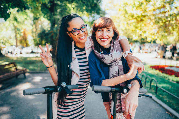istock Tourists exploring the city on motor scooters 2159952408
