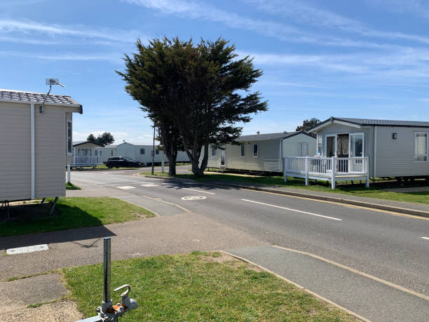 istock Caravan site with main road, taken on a hot summers day, clear skies with light cloud 2159954713