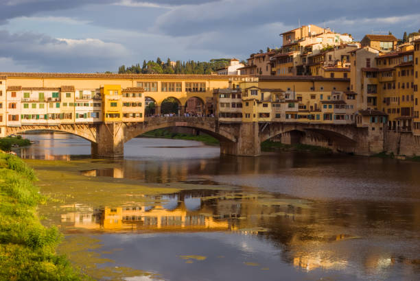 istock Sunset in Florence, Arno river and the Ponte Vecchio, Italy 2159956155