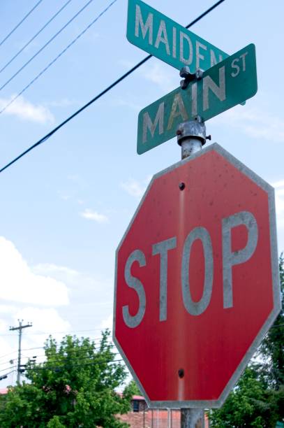 istock Intersection signs with stop sign 2159956273