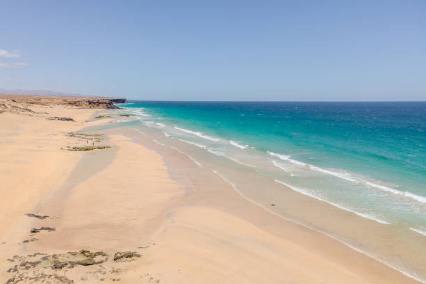 istock Ocean beach aerial view with drone 2159958713