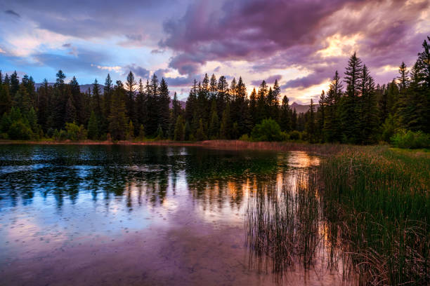 istock Dramatic Mountain Sunset Over Mountain Lake 2159960286