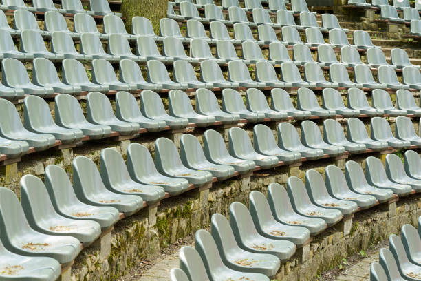 Rows of seats for spectators at a venue with an open-air stage in Germany