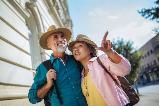 istock Elderly married couple exploring new city. 2159965418