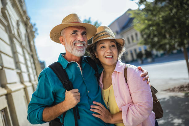 istock Elderly married couple exploring new city. 2159965428