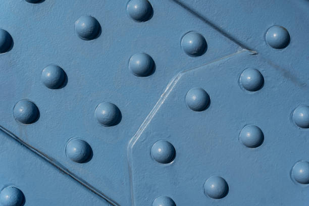 istock Photo background texture, metal surface with rivets. 2159974184