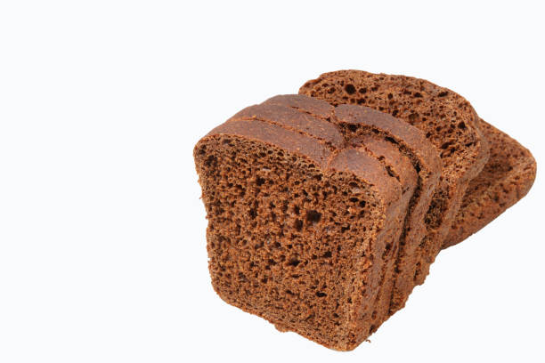 A loaf of rye bread on a white background. Close-up. Isolated.
