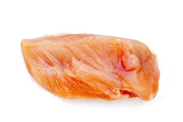istock Uncooked raw chicken  breast fillets on white background. 2159987450