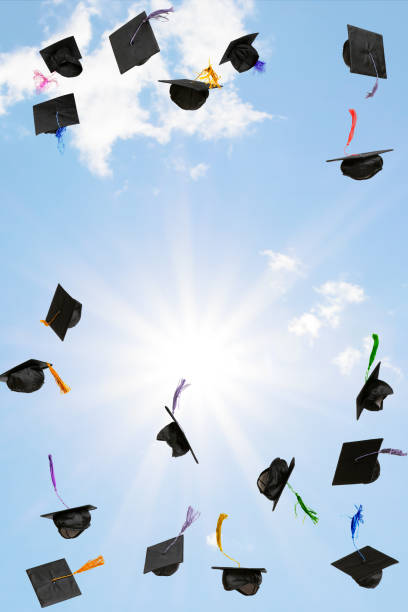 istock Mortarboards flying in the sky 2159988602