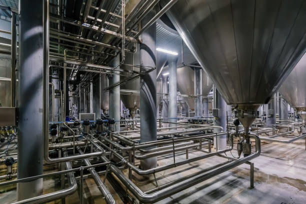 istock Large industrial stainless steel vats for fermentation in modern brewery 2159991143