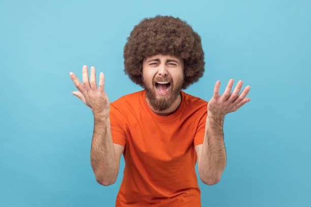 istock Man spreading hands, seriously looking at camera, family quarrel, misunderstanding. 2159993709