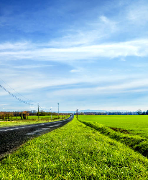 Countryside road in rural landscape in France
