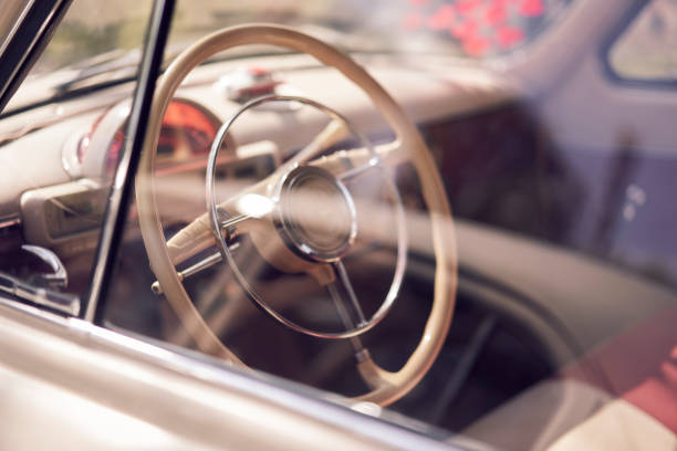 istock Vintage car steering wheel closeup with classic dashboard, nostalgia and traditional design 2159999511