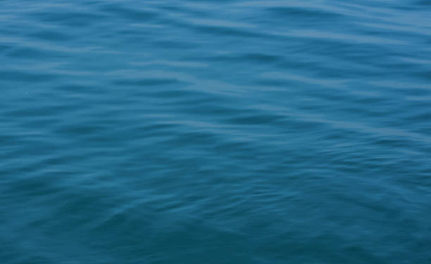 istock Blue sea water is natural waves. 2160001937