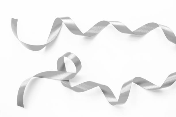 istock Silver ribbon satin bow curly scroll set isolated on white background with clipping path for Christmas and wedding card confetti design decoration 2160002163