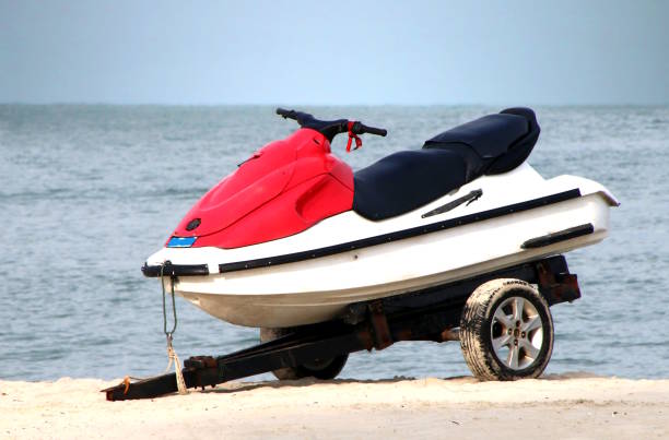 istock Jet ski or water scooter parking on the beach 2160005923