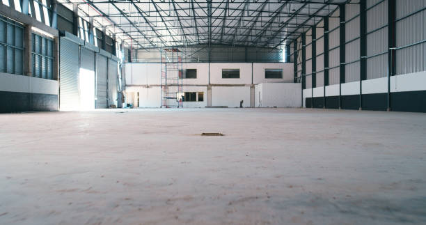 Empty space, warehouse and a building for industrial work, logistics or supply chain business. Industry, construction and a factory for ecommerce, trade or storage service for wholesale distribution