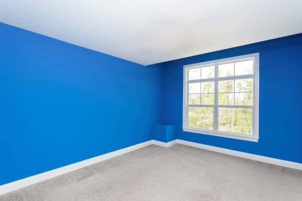 istock Vivid Blue Bedroom With Large Window And Carpeted Flooring 2160007191