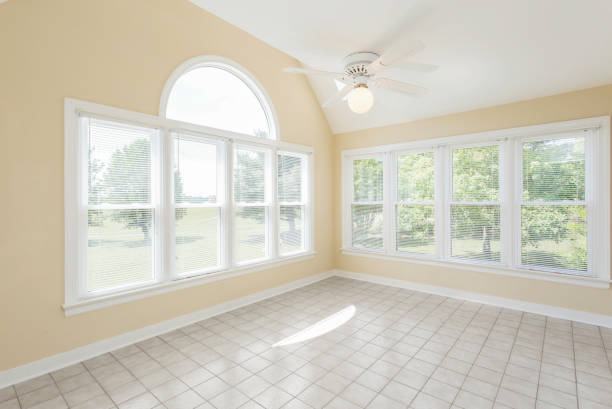 istock Bright Sunroom Interior With Large Windows And Abundant Natural Light 2160008146