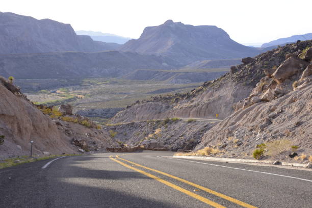 istock Beautiful Large Desert Canyon Divided By Highway 2160013726