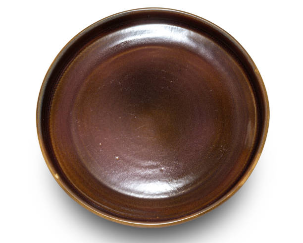 istock Brown circle ceramics plate isolated on white background. 2160013969