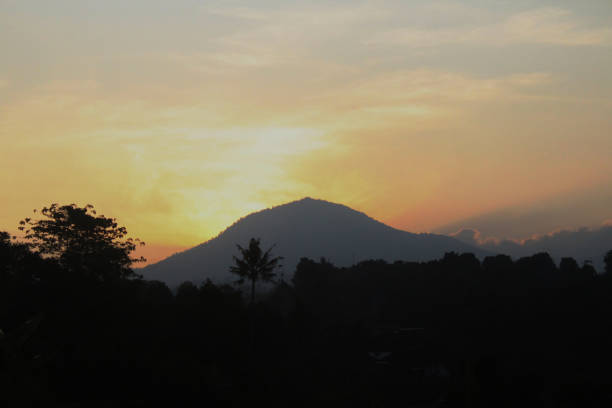 orange sky background behind the mountains