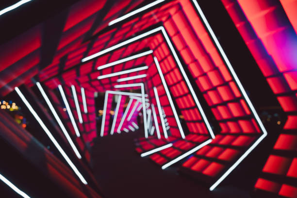 istock Abstract blur geometrical tunnel with red and white illuminated patterns background. 2160017202