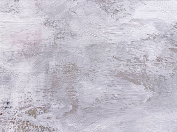 istock white paint brushstrokes texture on gray scratched background. 2160020423